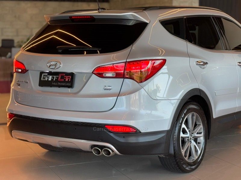 HYUNDAI SANTA FÉ 3.3 MPFI 4X4 7 LUGARES V6 270CV 2013/2014 GRIFFCAR MULTIMARCAS DOIS IRMÃOS / Carros no Vale