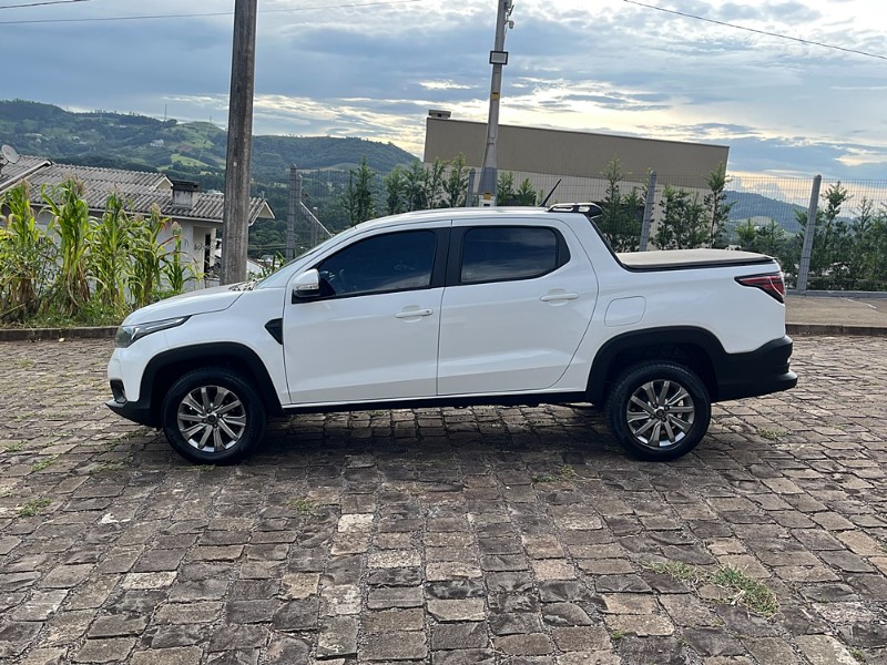FIAT STRADA 1.3 FIRE FREEDOM 8V CD 2021/2021 BOSCO AUTOMÓVEIS GUAPORÉ / Carros no Vale