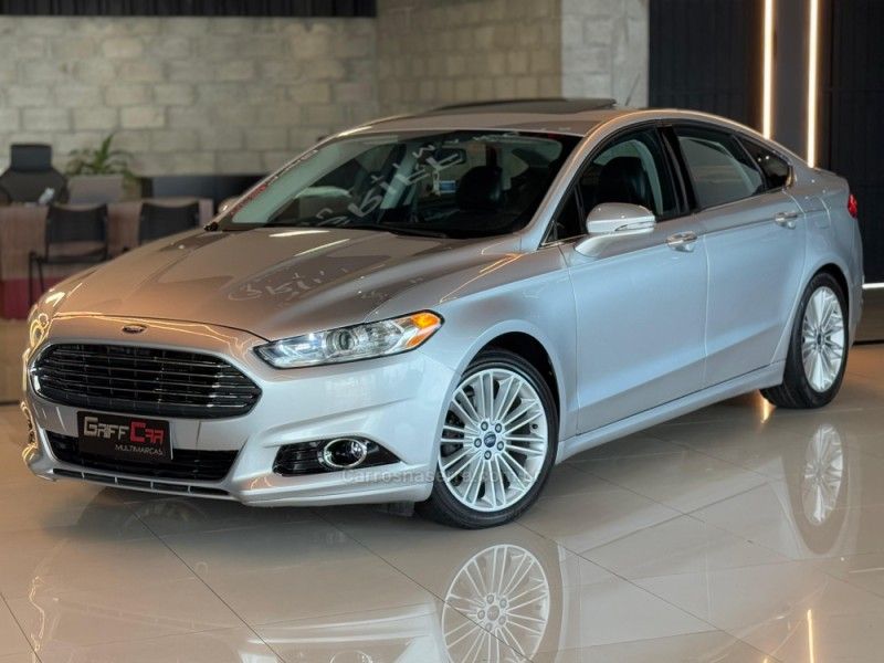 FORD FUSION 2.0 TITANIUM GTDI ECOBOOST FWD 2013/2014 GRIFFCAR MULTIMARCAS DOIS IRMÃOS / Carros no Vale