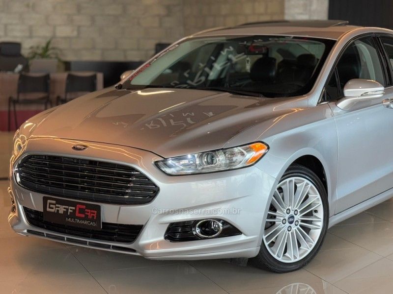 FORD FUSION 2.0 TITANIUM GTDI ECOBOOST FWD 2013/2014 GRIFFCAR MULTIMARCAS DOIS IRMÃOS / Carros no Vale