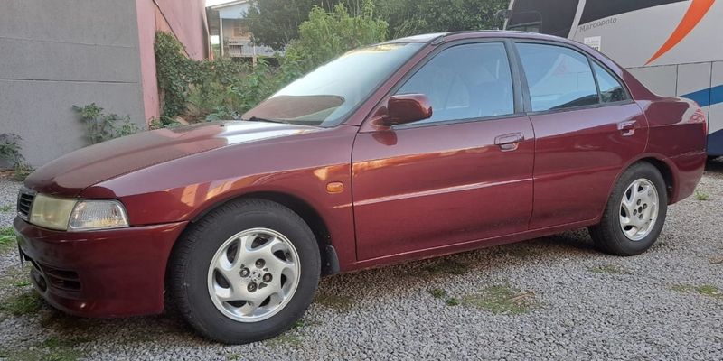Mitsubishi LANCER 1.6 GLXI 16V GASOLINA 4P MANUAL 1998/1998 CAMINHÕES & CAMIONETAS PASSO FUNDO / Carros no Vale
