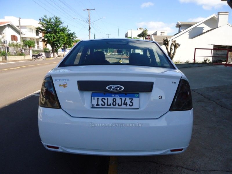 FORD FIESTA 1.6 ROCAM SE PLUS SEDAN 8V 2012/2012 BOURSCHEID CARROS E MOTOS SANTA CLARA DO SUL / Carros no Vale