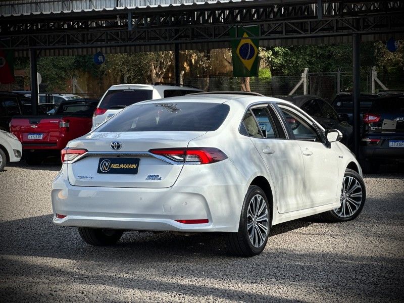 Toyota COROLLA ALTIS 1.8 HYBRID PREMIUM CVT 2023 NEUMANN VEÍCULOS ARROIO DO MEIO / Carros no Vale