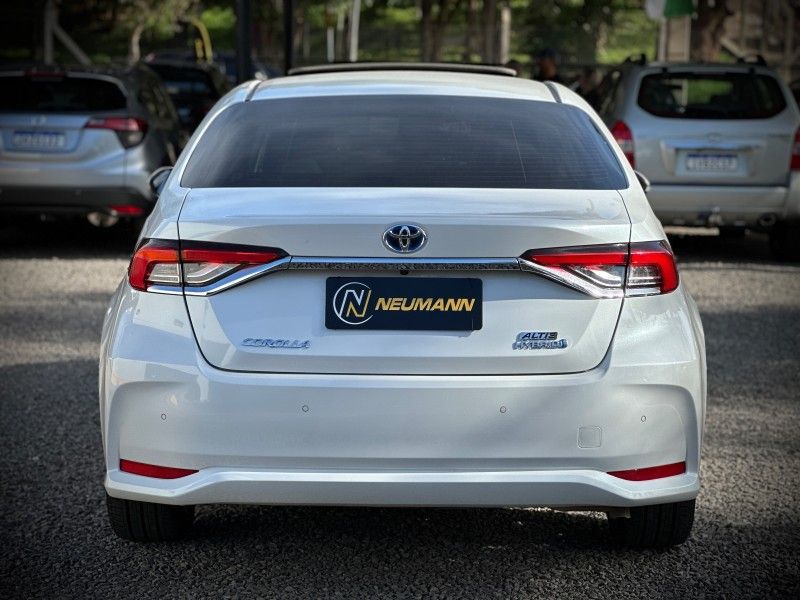 Toyota COROLLA ALTIS 1.8 HYBRID PREMIUM CVT 2023 NEUMANN VEÍCULOS ARROIO DO MEIO / Carros no Vale