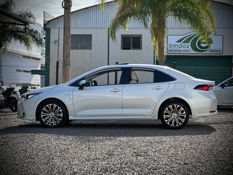 Toyota COROLLA ALTIS 1.8 HYBRID PREMIUM CVT 2023 NEUMANN VEÍCULOS ARROIO DO MEIO / Carros no Vale