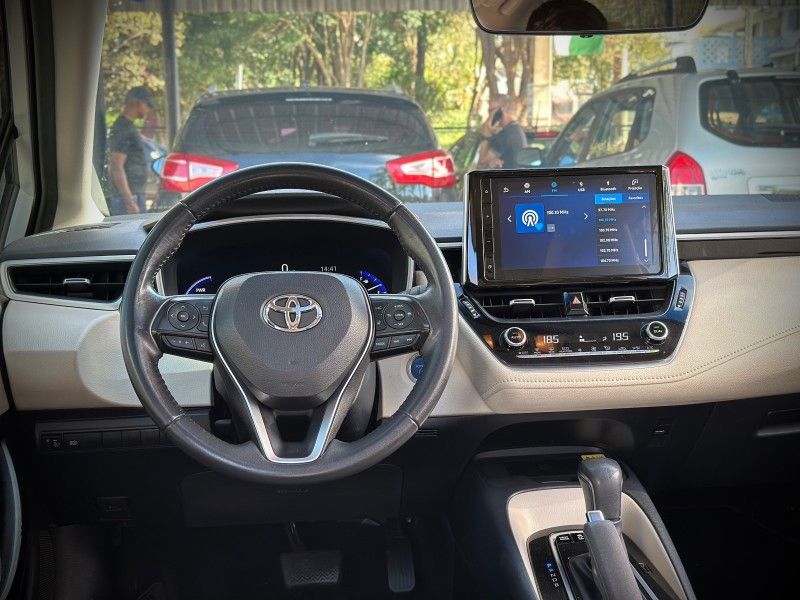 Toyota COROLLA ALTIS 1.8 HYBRID PREMIUM CVT 2023 NEUMANN VEÍCULOS ARROIO DO MEIO / Carros no Vale