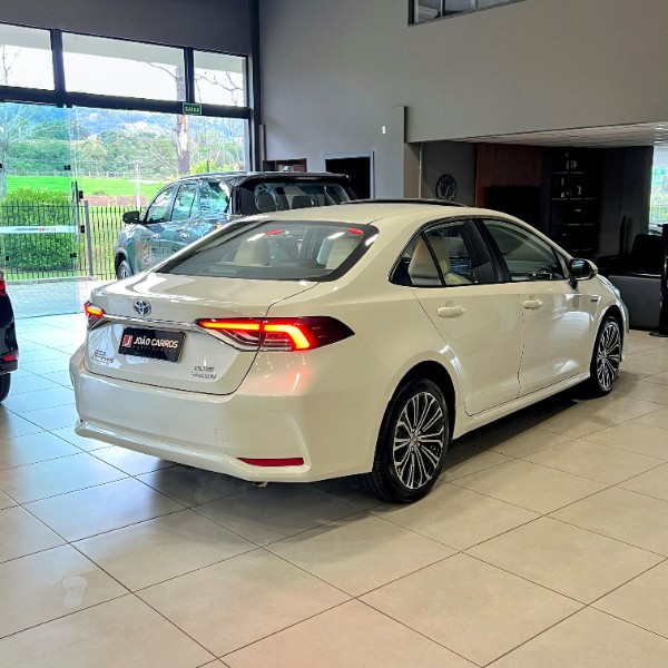 TOYOTA COROLLA 1.8 ALTIS PREMIUM 16V HÍBRIDO 2020/2020 JOÃO CARROS MULTIMARCAS GUAPORÉ / Carros no Vale