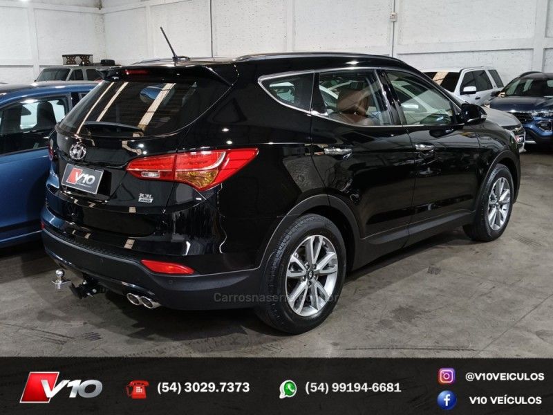 HYUNDAI SANTA FÉ 3.3 MPFI 4X4 7 LUGARES V6 270CV 2014/2015 V10 VEÍCULOS CAXIAS DO SUL / Carros no Vale