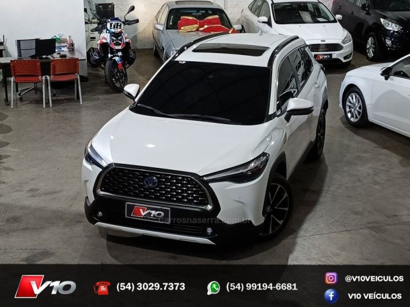 TOYOTA COROLLA 1.8 CROSS XRX 16V HÍBRIDO 2022/2023 V10 VEÍCULOS CAXIAS DO SUL / Carros no Vale