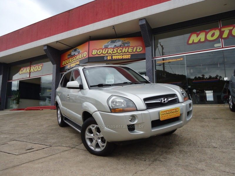 HYUNDAI TUCSON 2.0 MPFI GLS 16V 143CV 2WD 2013/2013 BOURSCHEID CARROS E MOTOS SANTA CLARA DO SUL / Carros no Vale
