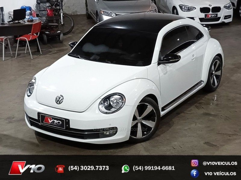 VOLKSWAGEN FUSCA 2.0 TSI 16V 2013/2014 V10 VEÍCULOS CAXIAS DO SUL / Carros no Vale VOLKSWAGEN FUSCA 2.0 TSI 16V 2013/2014 V10 VEÍCULOS CAXIAS DO SUL / Carros no Vale