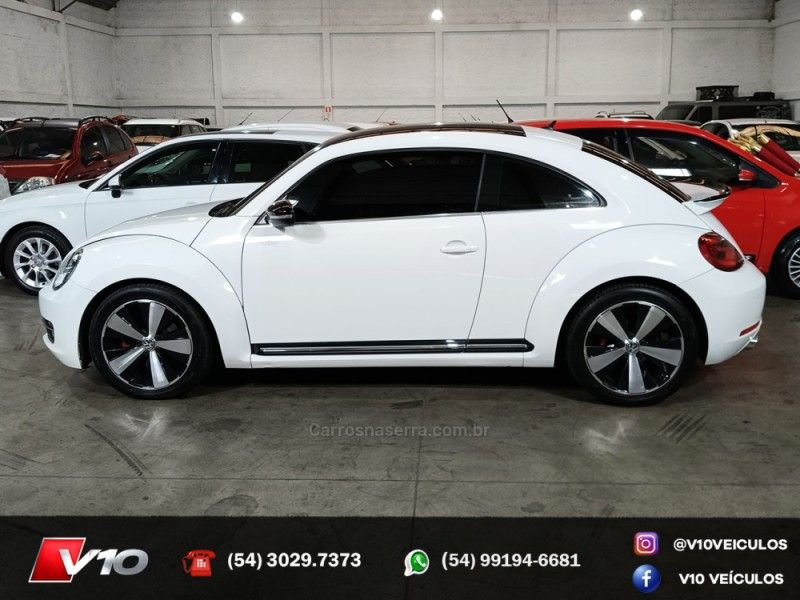 VOLKSWAGEN FUSCA 2.0 TSI 16V 2013/2014 V10 VEÍCULOS CAXIAS DO SUL / Carros no Vale VOLKSWAGEN FUSCA 2.0 TSI 16V 2013/2014 V10 VEÍCULOS CAXIAS DO SUL / Carros no Vale