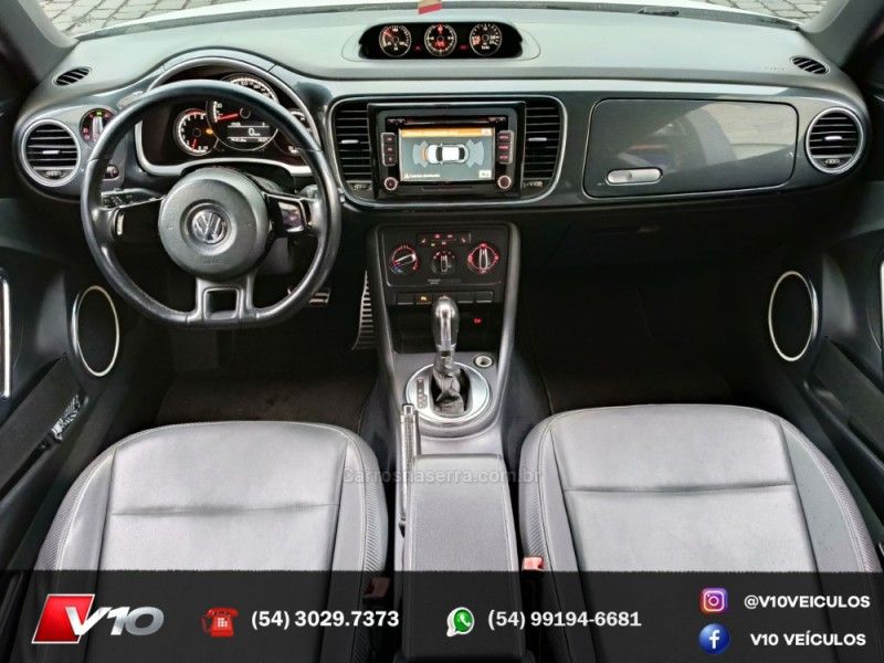 VOLKSWAGEN FUSCA 2.0 TSI 16V 2013/2014 V10 VEÍCULOS CAXIAS DO SUL / Carros no Vale VOLKSWAGEN FUSCA 2.0 TSI 16V 2013/2014 V10 VEÍCULOS CAXIAS DO SUL / Carros no Vale