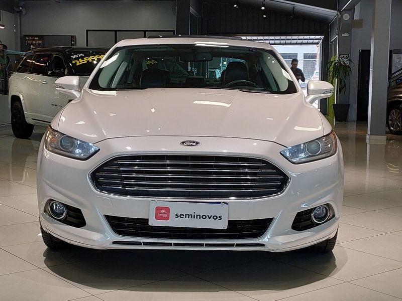 Ford FUSION 2.0 TITANIUM FWD 16V GASOLINA 4P AUTOMÁTICO 2013/2014 BETIOLO NOVOS E SEMINOVOS LAJEADO / Carros no Vale Ford FUSION 2.0 TITANIUM FWD 16V GASOLINA 4P AUTOMÁTICO 2013/2014 BETIOLO NOVOS E SEMINOVOS LAJEADO / Carros no Vale