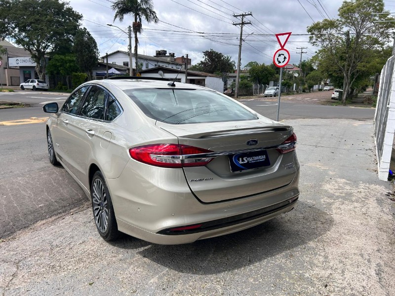 FORD FUSION TITANIUM HYBRID 2.0 2017/2017 LS MULTIMARCAS VENÂNCIO AIRES / Carros no Vale