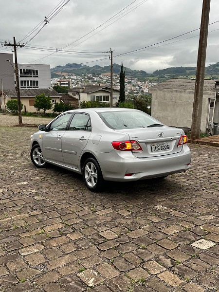 TOYOTA COROLLA 1.8 GLI 16V FLEX 4P MANUAL 2014/2014 BOSCO AUTOMÓVEIS GUAPORÉ / Carros no Vale