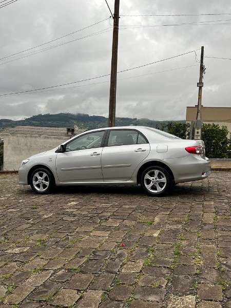TOYOTA COROLLA 1.8 GLI 16V FLEX 4P MANUAL 2014/2014 BOSCO AUTOMÓVEIS GUAPORÉ / Carros no Vale