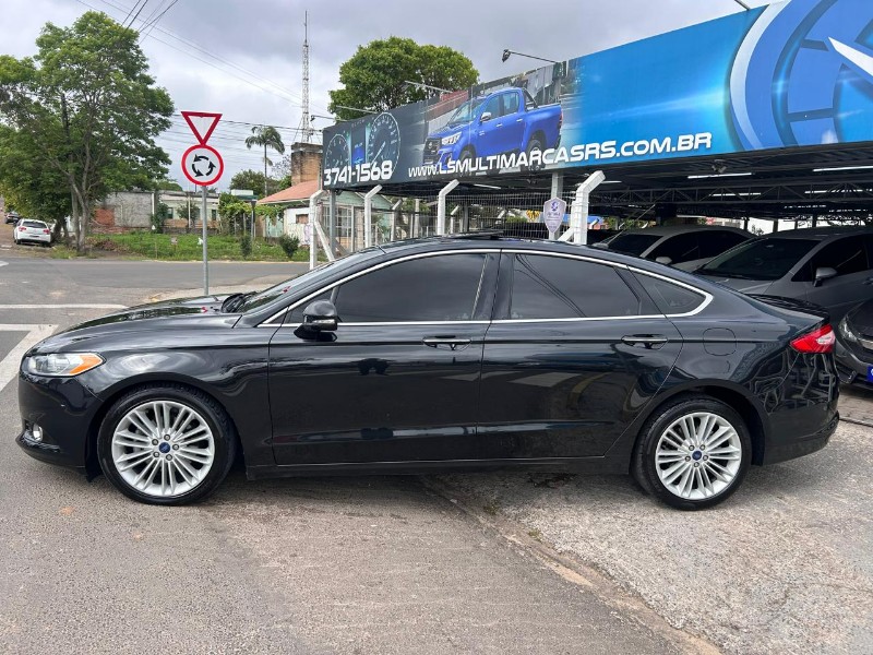 FORD FUSION TITANIUM 2.0 GTDI ECOBO.AWD AUT 2015/2015 LS MULTIMARCAS VENÂNCIO AIRES / Carros no Vale FORD FUSION TITANIUM 2.0 GTDI ECOBO.AWD AUT 2015/2015 LS MULTIMARCAS VENÂNCIO AIRES / Carros no Vale