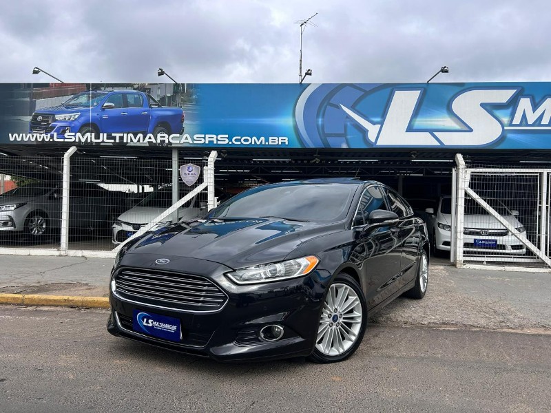 FORD FUSION TITANIUM 2.0 GTDI ECOBO.AWD AUT 2015/2015 LS MULTIMARCAS VENÂNCIO AIRES / Carros no Vale FORD FUSION TITANIUM 2.0 GTDI ECOBO.AWD AUT 2015/2015 LS MULTIMARCAS VENÂNCIO AIRES / Carros no Vale