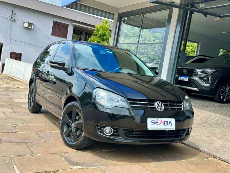 VOLKSWAGEN POLO 1.6 2014/2014 SÉTIMA VEÍCULOS GUAPORÉ / Carros no Vale