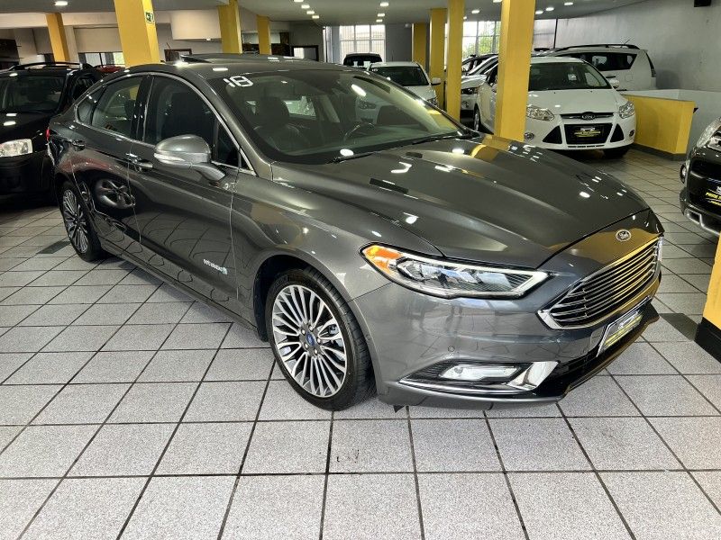 FORD FUSION 2.0 TITANIUM 16V HÍBRIDO 2018/2018 PRIME MULTIMARCAS CAXIAS DO SUL / Carros no Vale FORD FUSION 2.0 TITANIUM 16V HÍBRIDO 2018/2018 PRIME MULTIMARCAS CAXIAS DO SUL / Carros no Vale