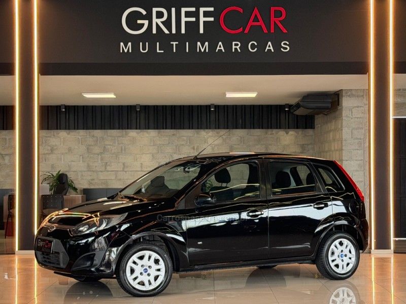FORD FIESTA 1.0 ROCAM SE 8V 2013/2014 GRIFFCAR MULTIMARCAS DOIS IRMÃOS / Carros no Vale FORD FIESTA 1.0 ROCAM SE 8V 2013/2014 GRIFFCAR MULTIMARCAS DOIS IRMÃOS / Carros no Vale