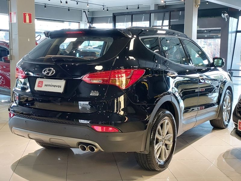 Hyundai SANTA FÉ 3.3 MPFI 4X4 7 LUGARES V6 270CV GASOLINA 4P AUTOMÁTICO 2013/2014 BETIOLO NOVOS E SEMINOVOS LAJEADO / Carros no Vale