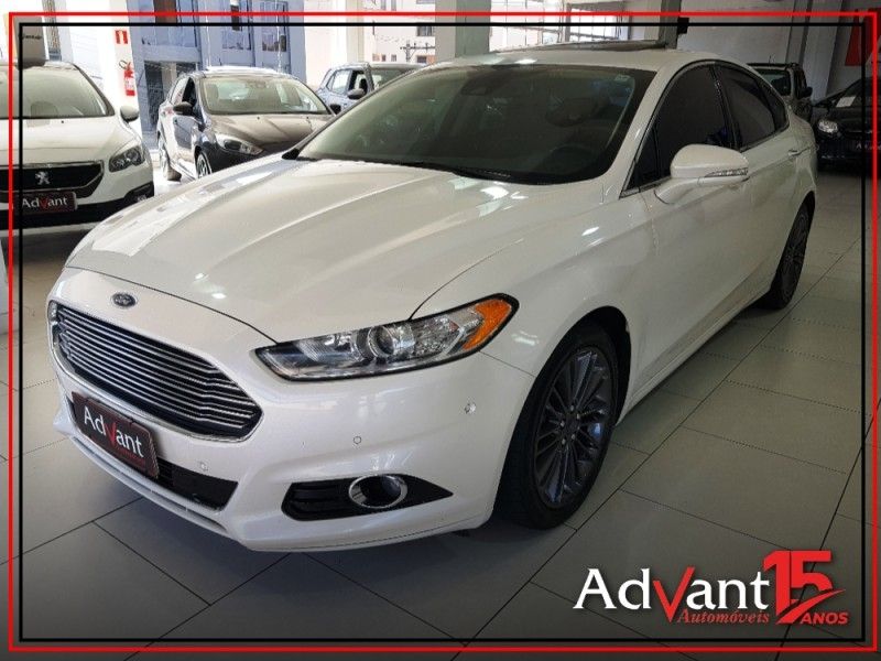 Ford FUSION 2.0 TITANIUM AWD 16V GASOLINA 4P AUTOMÁTICO 2013/2014 ADVANT AUTOMÓVEIS CAXIAS DO SUL / Carros no Vale Ford FUSION 2.0 TITANIUM AWD 16V GASOLINA 4P AUTOMÁTICO 2013/2014 ADVANT AUTOMÓVEIS CAXIAS DO SUL / Carros no Vale