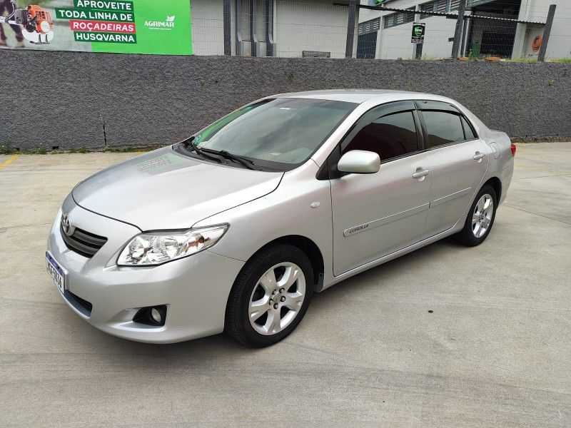 TOYOTA COROLLA 1.8 GLI 16V 2009/2010 HUBNER MULTIMARCAS FARROUPILHA / Carros no Vale TOYOTA COROLLA 1.8 GLI 16V 2009/2010 HUBNER MULTIMARCAS FARROUPILHA / Carros no Vale