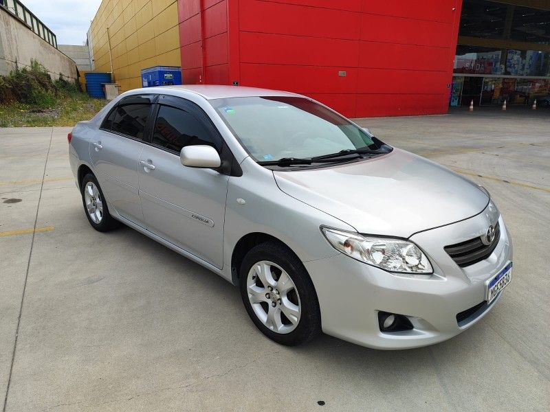 TOYOTA COROLLA 1.8 GLI 16V 2009/2010 HUBNER MULTIMARCAS FARROUPILHA / Carros no Vale TOYOTA COROLLA 1.8 GLI 16V 2009/2010 HUBNER MULTIMARCAS FARROUPILHA / Carros no Vale