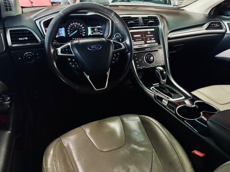 Ford FUSION 2.0 TITANIUM AWD 16V GASOLINA 4P AUTOMÁTICO 2015/2015 CASTELLAN E TOMAZONI MOTORS CAXIAS DO SUL / Carros no Vale Ford FUSION 2.0 TITANIUM AWD 16V GASOLINA 4P AUTOMÁTICO 2015/2015 CASTELLAN E TOMAZONI MOTORS CAXIAS DO SUL / Carros no Vale