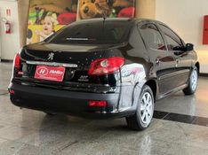 Peugeot 207 XR PASSION 1.4 2010 HÉLIO AUTOMÓVEIS LAJEADO / Carros no Vale