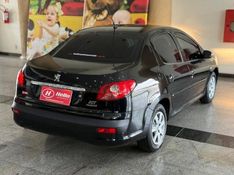 Peugeot 207 XR PASSION 1.4 2010 HÉLIO AUTOMÓVEIS LAJEADO / Carros no Vale