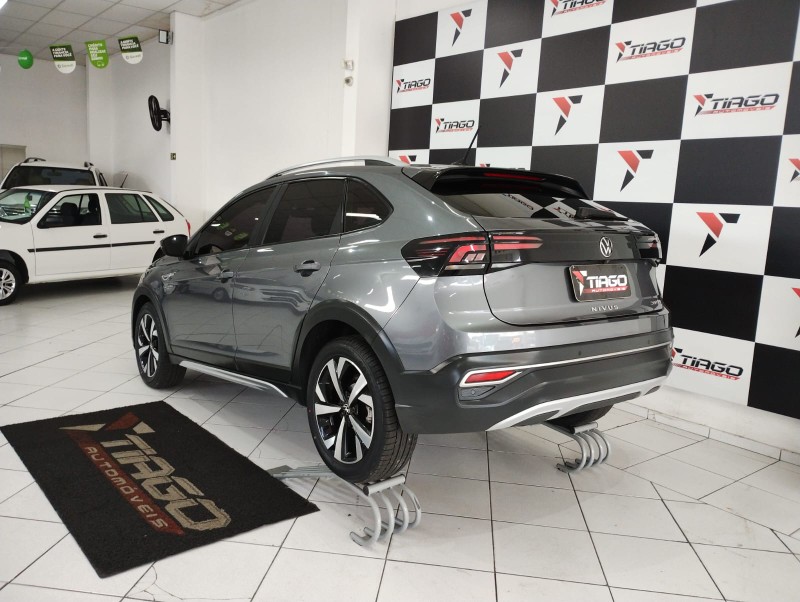VOLKSWAGEN NIVUS 1.0 200 TSI TOTAL FLEX HIGHLINE AUTOMÁTICO 2021/2021 TIAGO AUTOMÓVEIS VENÂNCIO AIRES / Carros no Vale