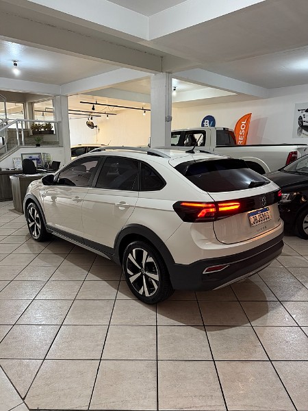 VOLKSWAGEN NIVUS 1.0 TSI HIGHLINE FLEX 4P AUTOMÁTICO 2022/2022 BOSCO AUTOMÓVEIS GUAPORÉ / Carros no Vale