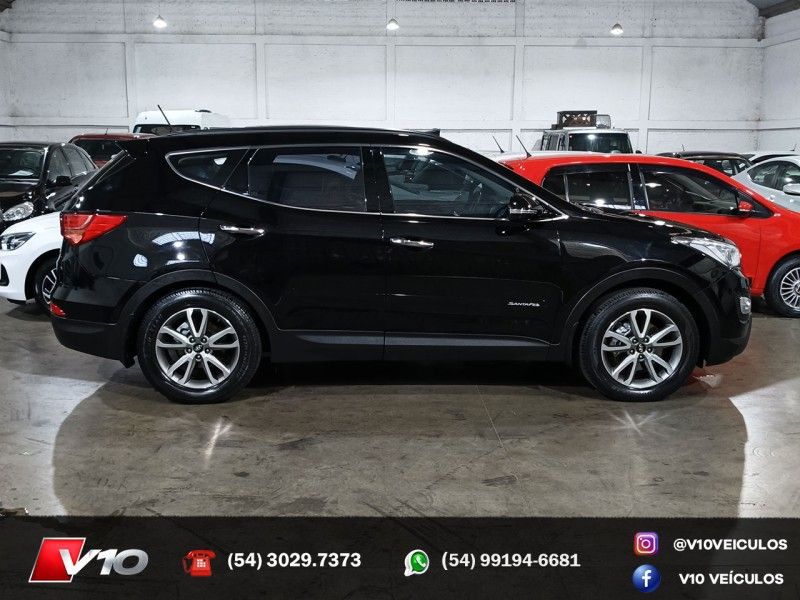 HYUNDAI SANTA FÉ 3.3 MPFI 4X4 7 LUGARES V6 270CV 2014/2015 V10 VEÍCULOS CAXIAS DO SUL / Carros no Vale HYUNDAI SANTA FÉ 3.3 MPFI 4X4 7 LUGARES V6 270CV 2014/2015 V10 VEÍCULOS CAXIAS DO SUL / Carros no Vale