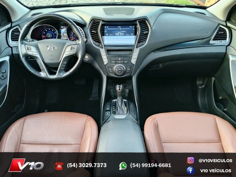 HYUNDAI SANTA FÉ 3.3 MPFI 4X4 7 LUGARES V6 270CV 2014/2015 V10 VEÍCULOS CAXIAS DO SUL / Carros no Vale HYUNDAI SANTA FÉ 3.3 MPFI 4X4 7 LUGARES V6 270CV 2014/2015 V10 VEÍCULOS CAXIAS DO SUL / Carros no Vale