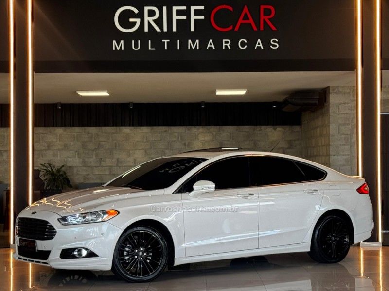 FORD FUSION 2.0 TITANIUM AWD 16V 2013/2014 GRIFFCAR MULTIMARCAS DOIS IRMÃOS / Carros no Vale