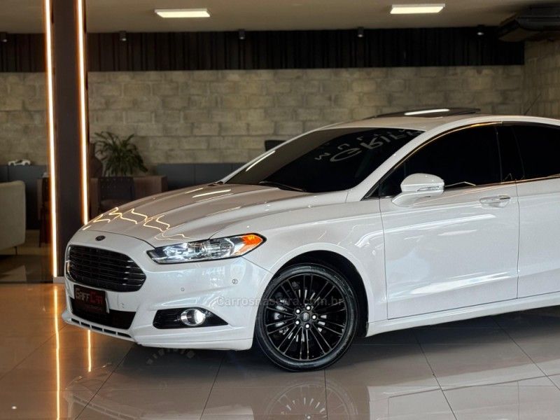 FORD FUSION 2.0 TITANIUM AWD 16V 2013/2014 GRIFFCAR MULTIMARCAS DOIS IRMÃOS / Carros no Vale
