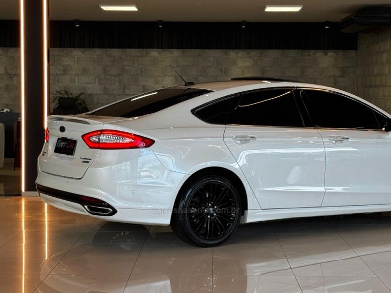 FORD FUSION 2.0 TITANIUM AWD 16V 2013/2014 GRIFFCAR MULTIMARCAS DOIS IRMÃOS / Carros no Vale