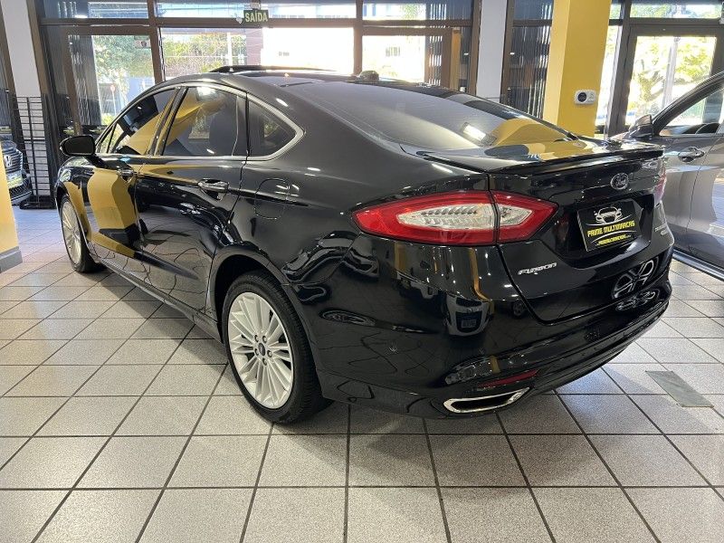 FORD FUSION 2.0 TITANIUM AWD 16V 2013/2013 PRIME MULTIMARCAS CAXIAS DO SUL / Carros no Vale