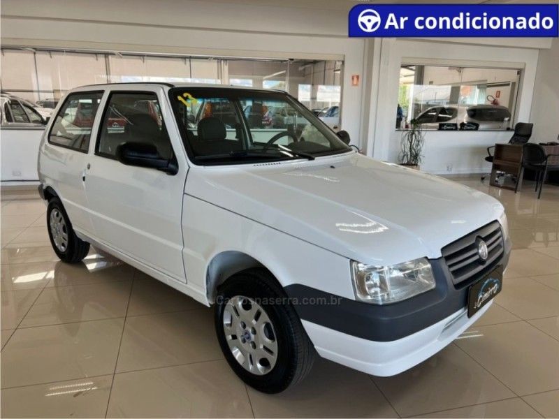 FIAT UNO 1.0 MPI MILLE FIRE ECONOMY 8V 2013/2013 CIMIRRO AUTOMÓVEIS TAQUARA / Carros no Vale