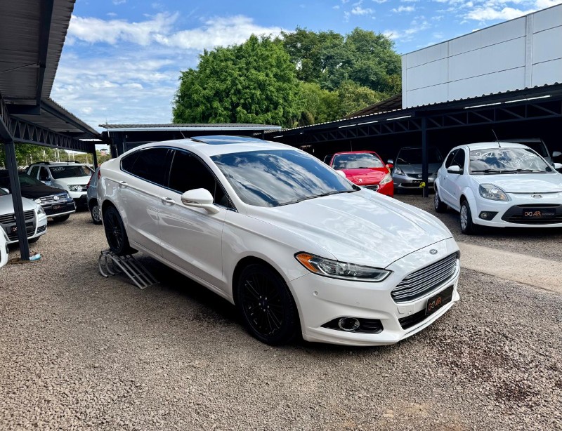 FORD FUSION 2.0 TITANIUM GTDI ECOBOOST AWD AUTOMÁTICO /2016 AR MULTIMARCAS VENÂNCIO AIRES / Carros no Vale