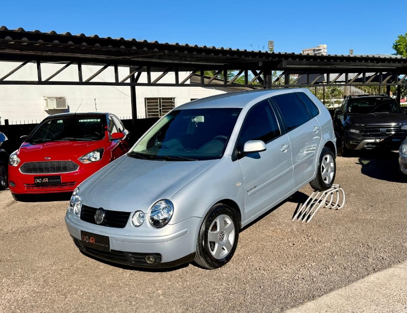 VOLKSWAGEN POLO HATCH 1.6 /2006 AR MULTIMARCAS VENÂNCIO AIRES / Carros no Vale