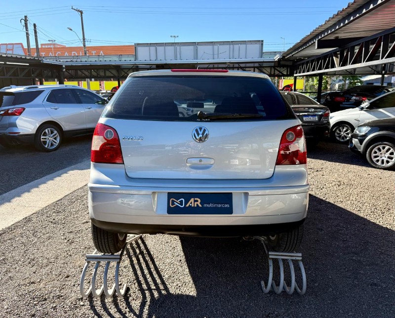 VOLKSWAGEN POLO HATCH 1.6 /2006 AR MULTIMARCAS VENÂNCIO AIRES / Carros no Vale
