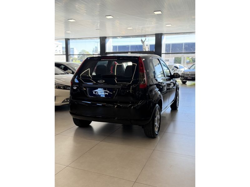 FORD FIESTA 1.0 ROCAM HATCH 8V 2012/2013 LEHMEN VEÍCULOS VENÂNCIO AIRES / Carros no Vale
