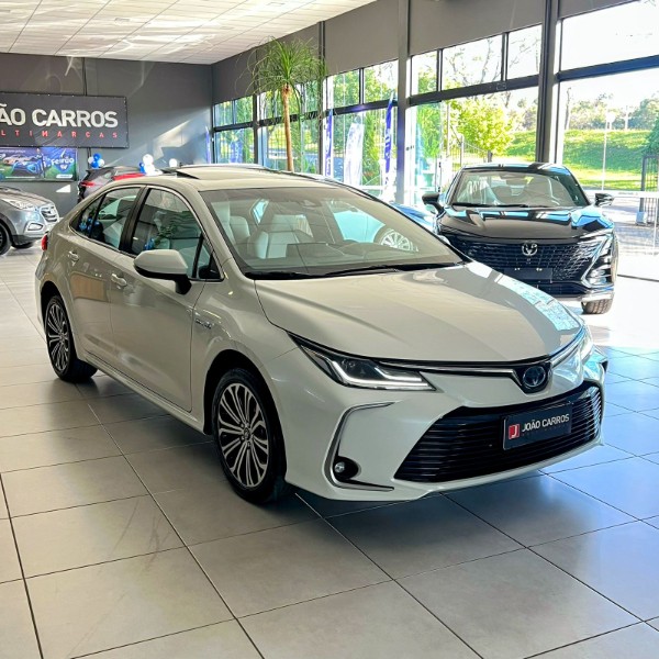 TOYOTA COROLLA ALTIS PREMIUM HYBRID 1.8 2021/2021 JOÃO CARROS MULTIMARCAS GUAPORÉ / Carros no Vale TOYOTA COROLLA ALTIS PREMIUM HYBRID 1.8 2021/2021 JOÃO CARROS MULTIMARCAS GUAPORÉ / Carros no Vale