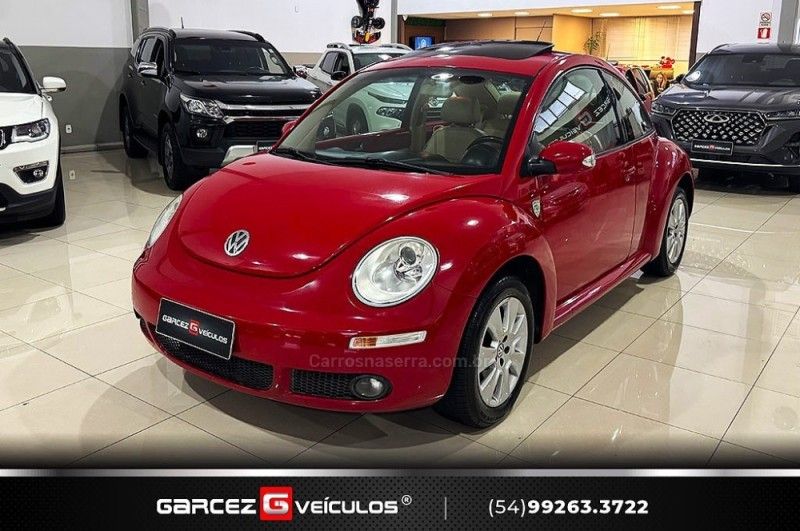 VOLKSWAGEN NEW BEETLE 2.0 MI 8V TIPTRONIC 2009/2010 GARCEZ VEÍCULOS BENTO GONÇALVES / Carros no Vale VOLKSWAGEN NEW BEETLE 2.0 MI 8V TIPTRONIC 2009/2010 GARCEZ VEÍCULOS BENTO GONÇALVES / Carros no Vale