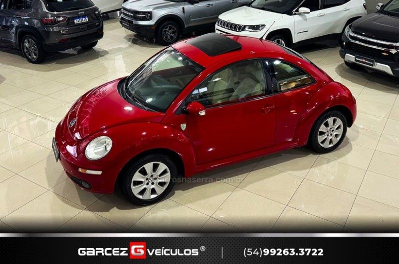 VOLKSWAGEN NEW BEETLE 2.0 MI 8V TIPTRONIC 2009/2010 GARCEZ VEÍCULOS BENTO GONÇALVES / Carros no Vale VOLKSWAGEN NEW BEETLE 2.0 MI 8V TIPTRONIC 2009/2010 GARCEZ VEÍCULOS BENTO GONÇALVES / Carros no Vale
