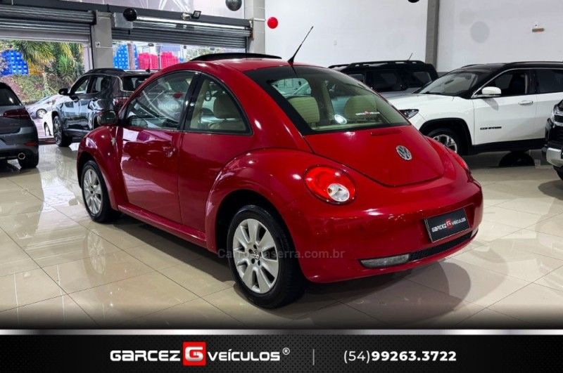 VOLKSWAGEN NEW BEETLE 2.0 MI 8V TIPTRONIC 2009/2010 GARCEZ VEÍCULOS BENTO GONÇALVES / Carros no Vale VOLKSWAGEN NEW BEETLE 2.0 MI 8V TIPTRONIC 2009/2010 GARCEZ VEÍCULOS BENTO GONÇALVES / Carros no Vale